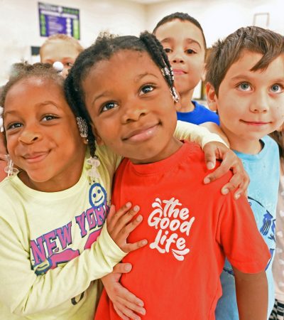 Elementary-age children going back to school in summer 2024